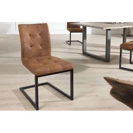 Chaise cantilever style capitonné coloris cognac