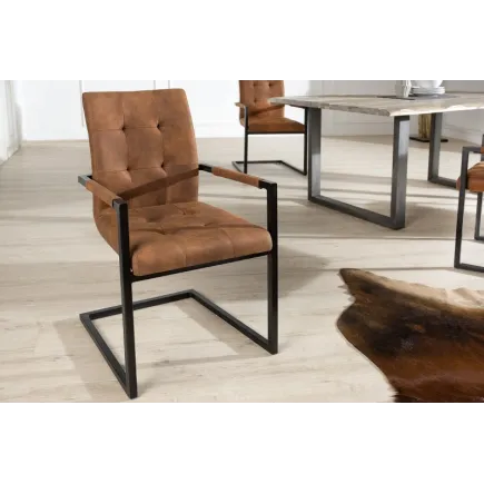Chaise accoudoir cantilever capitonnées coloris Oxford  cognac