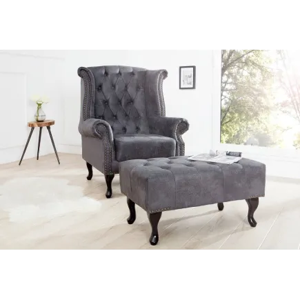 Fauteuil design Chesterfield coloris gris capitonné